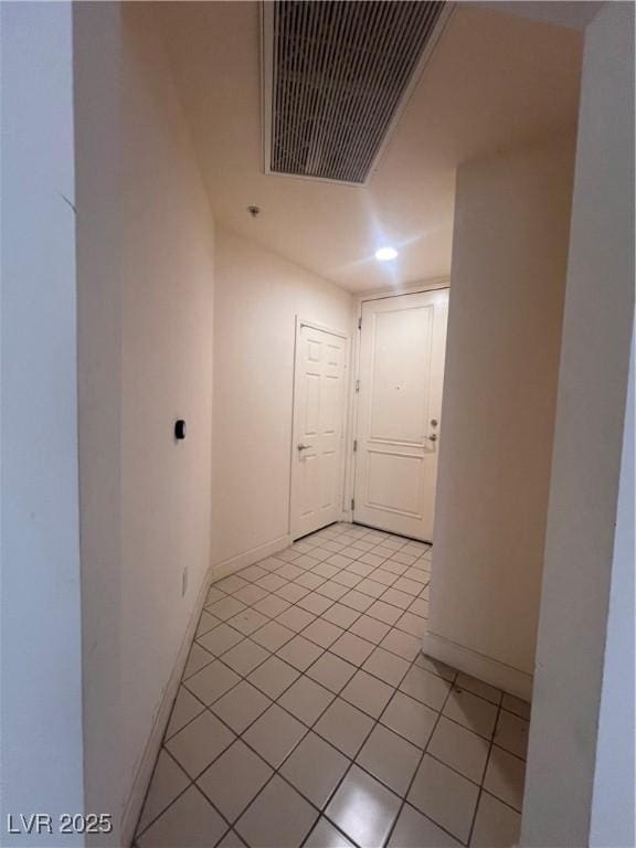 87 E Agate Ave Unit 202, Las Vegas, NV 89123 - empty room featuring light tile patterned flooring and baseboards