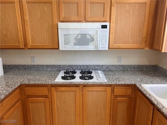 87 E Agate Ave Unit 202, Las Vegas, NV 89123 - kitchen featuring white appliances