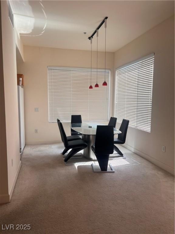 87 E Agate Ave Unit 202, Las Vegas, NV 89123 - dining area featuring light carpet and baseboards