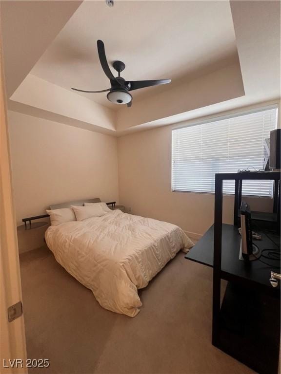 87 E Agate Ave Unit 202, Las Vegas, NV 89123 - carpeted bedroom with a tray ceiling and a ceiling fan