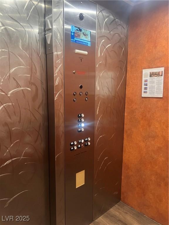 87 E Agate Ave Unit 202, Las Vegas, NV 89123 - elevator featuring wood finished floors
