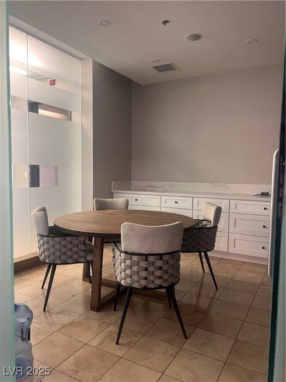 87 E Agate Ave Unit 202, Las Vegas, NV 89123 - dining room featuring light tile patterned flooring