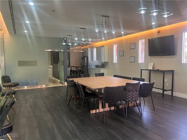 87 E Agate Ave Unit 202, Las Vegas, NV 89123 - dining space featuring baseboards and wood finished floors