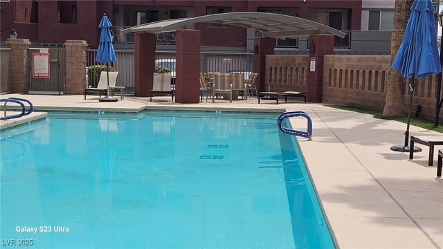 87 E Agate Ave Unit 202, Las Vegas, NV 89123 - community pool featuring a patio area