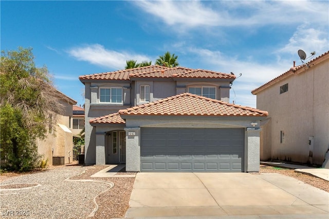10162 Lemon Thyme St, Las Vegas, NV 89183 - mediterranean / spanish-style house featuring stucco siding, an attached garage, driveway, and a tiled roof