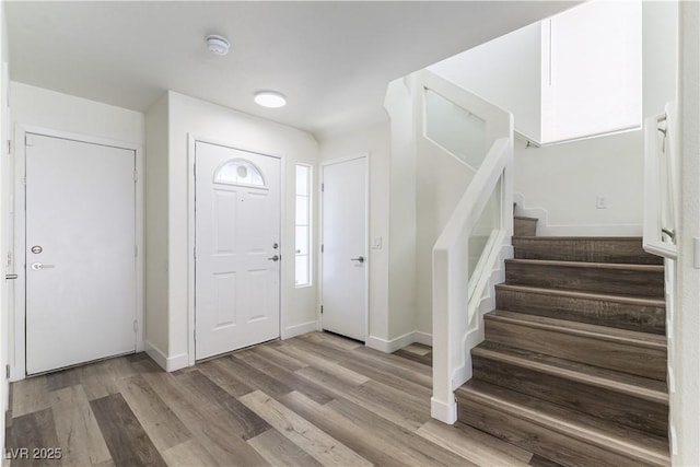 10162 Lemon Thyme St, Las Vegas, NV 89183 - entrance foyer featuring stairs, wood finished floors, and baseboards