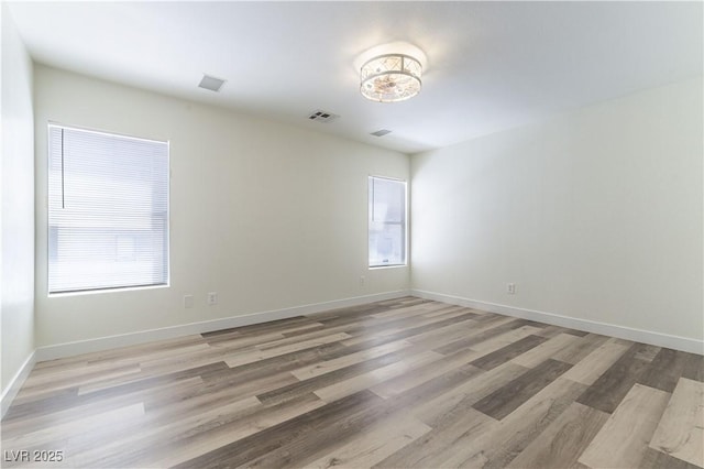 10162 Lemon Thyme St, Las Vegas, NV 89183 - spare room with light wood-type flooring and baseboards