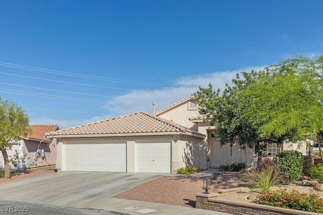 1079 Oak Shade Ln, Henderson, NV 89015 - view of front facade featuring stucco siding, a garage, concrete driveway, and a tile roof