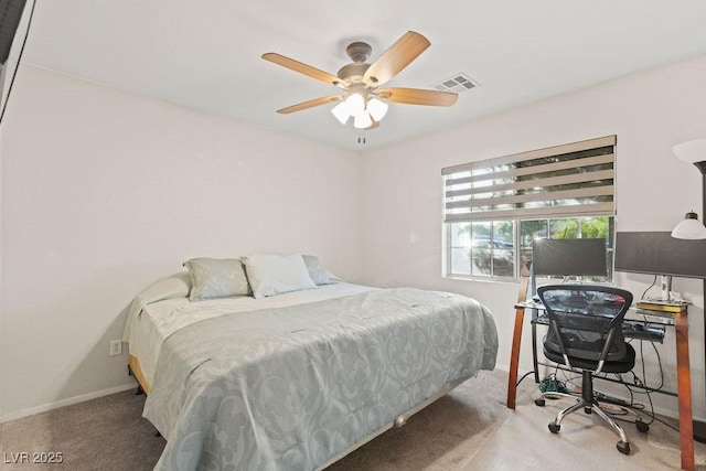 1079 Oak Shade Ln, Henderson, NV 89015 - carpeted bedroom featuring baseboards, an office area, and a ceiling fan