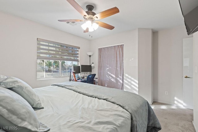 1079 Oak Shade Ln, Henderson, NV 89015 - bedroom with light colored carpet and a ceiling fan