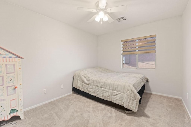 1079 Oak Shade Ln, Henderson, NV 89015 - bedroom featuring carpet flooring, baseboards, and a ceiling fan