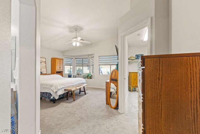 1079 Oak Shade Ln, Henderson, NV 89015 - carpeted bedroom featuring vaulted ceiling and ceiling fan