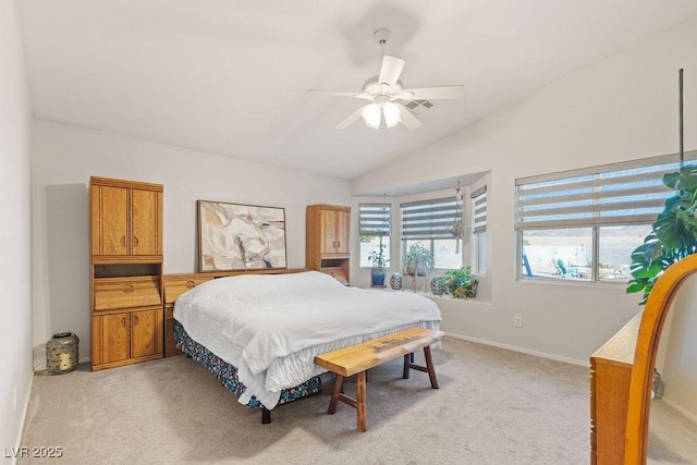 1079 Oak Shade Ln, Henderson, NV 89015 - bedroom featuring vaulted ceiling, light colored carpet, a ceiling fan, and baseboards
