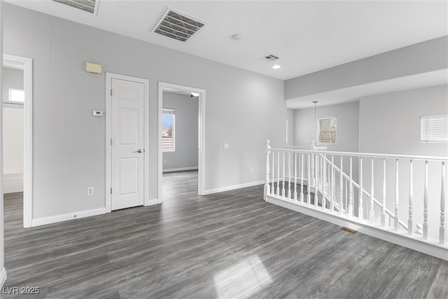 2231 Desert Prairie St, Las Vegas, NV 89135 - unfurnished room featuring dark wood finished floors, baseboards, and recessed lighting