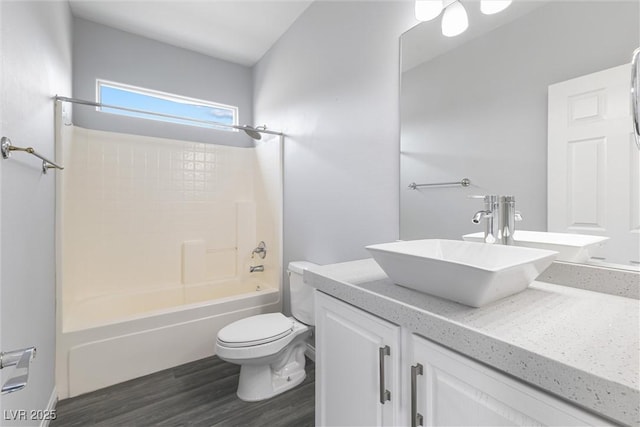 2231 Desert Prairie St, Las Vegas, NV 89135 - bathroom with vanity, toilet,  shower combination, and wood finished floors