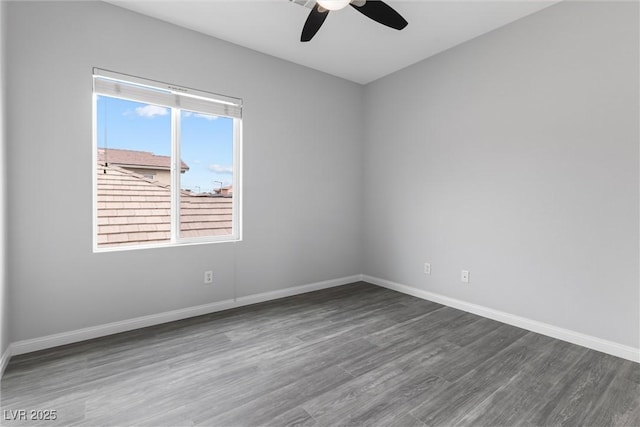 2231 Desert Prairie St, Las Vegas, NV 89135 - empty room featuring ceiling fan, dark wood-type flooring, and baseboards