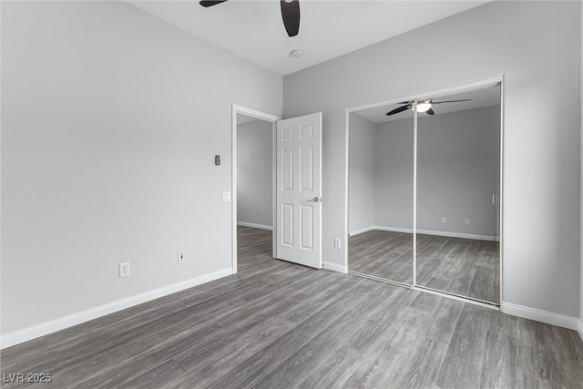 2231 Desert Prairie St, Las Vegas, NV 89135 - unfurnished bedroom with wood finished floors, baseboards, ceiling fan, and a closet