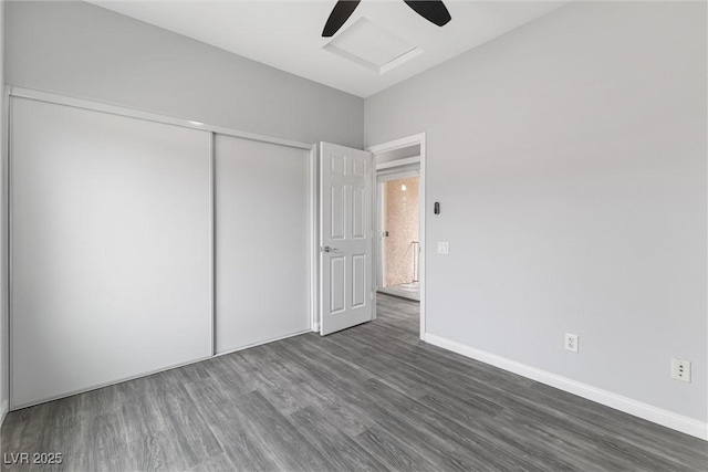 2231 Desert Prairie St, Las Vegas, NV 89135 - unfurnished bedroom with wood finished floors, a closet, attic access, and baseboards