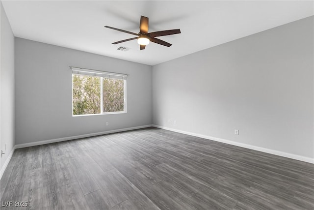 2231 Desert Prairie St, Las Vegas, NV 89135 - empty room featuring a ceiling fan, dark wood finished floors, and baseboards