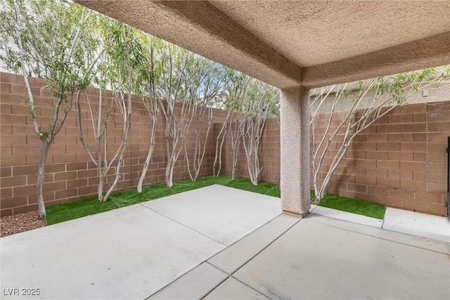 2231 Desert Prairie St, Las Vegas, NV 89135 - fenced backyard with a patio