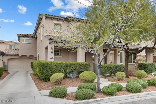 2231 Desert Prairie St, Las Vegas, NV 89135 - view of front of property with stucco siding, concrete driveway, a garage, and a tiled roof