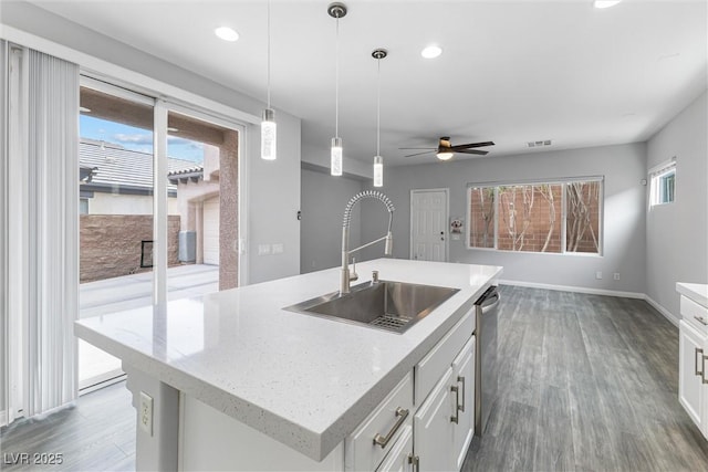 2231 Desert Prairie St, Las Vegas, NV 89135 - kitchen featuring a sink, ceiling fan, stainless steel dishwasher, wood finished floors, and recessed lighting
