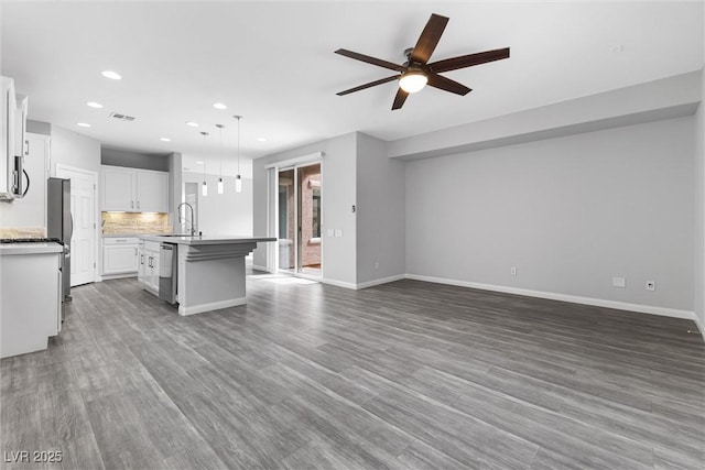 2231 Desert Prairie St, Las Vegas, NV 89135 - kitchen featuring ceiling fan, a sink, open floor plan, and recessed lighting