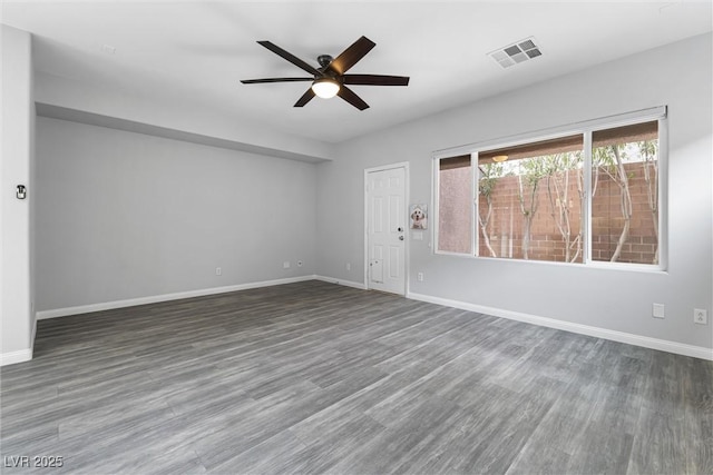 2231 Desert Prairie St, Las Vegas, NV 89135 - spare room with a ceiling fan, wood finished floors, and baseboards