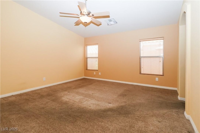 2787 Sunken Ship St, Laughlin, NV 89029 - empty room featuring carpet, ceiling fan, baseboards, and vaulted ceiling