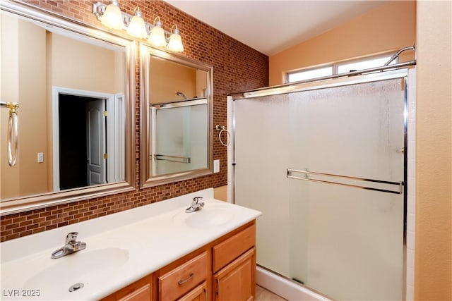 2787 Sunken Ship St, Laughlin, NV 89029 - full bathroom featuring a shower stall, tasteful backsplash, and double vanity