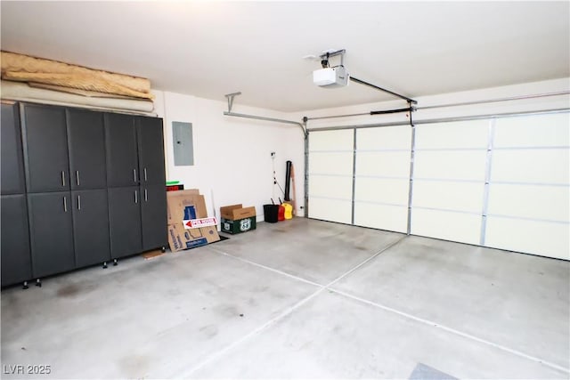 2787 Sunken Ship St, Laughlin, NV 89029 - garage featuring electric panel and a garage door opener