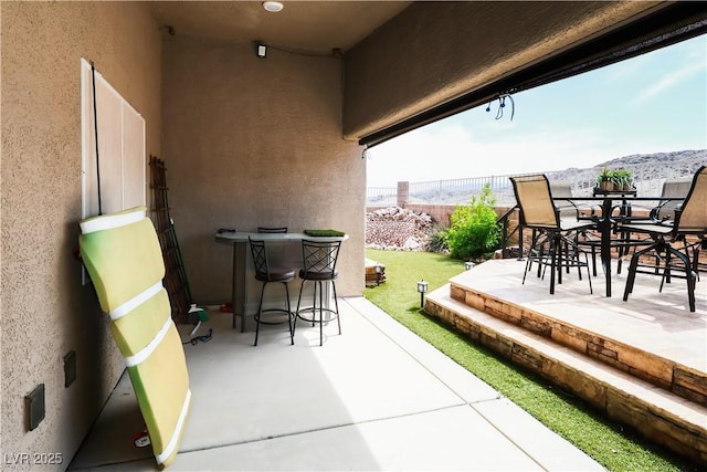 2787 Sunken Ship St, Laughlin, NV 89029 - view of patio / terrace with outdoor dining area and a mountain view