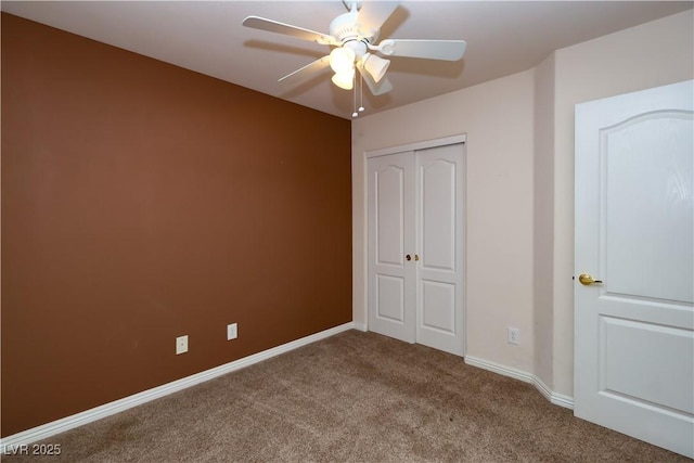 2787 Sunken Ship St, Laughlin, NV 89029 - unfurnished bedroom featuring carpet floors, a closet, baseboards, and a ceiling fan