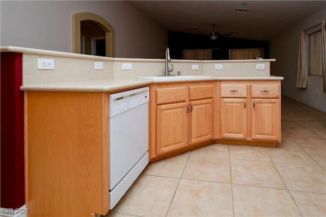 2787 Sunken Ship St, Laughlin, NV 89029 - kitchen with white dishwasher, a sink, a ceiling fan, lofted ceiling, and light tile patterned floors
