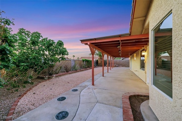 160 Coastal Pier Ct, Henderson, NV 89002 - patio terrace at dusk with a patio area and a fenced backyard