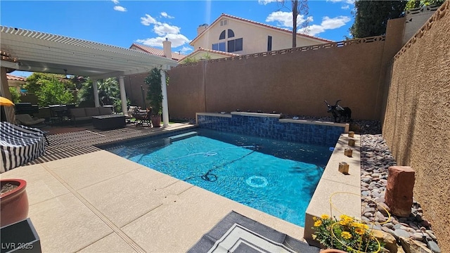 3355 Royal Bay Dr, Las Vegas, NV 89117 - view of pool with an outdoor living space, a patio area, and a fenced backyard