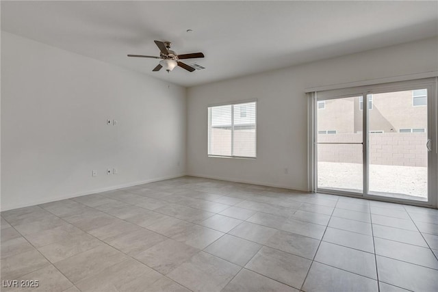 4448 Mahogany Hills Ave, Las Vegas, NV 89141 - empty room featuring ceiling fan, light tile patterned floors, and baseboards