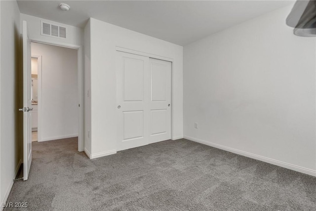 4448 Mahogany Hills Ave, Las Vegas, NV 89141 - unfurnished bedroom with carpet flooring, a closet, and baseboards