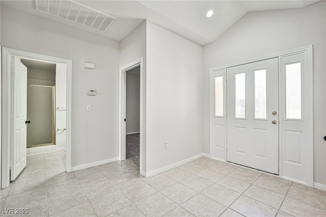 5316 Fieldstone Rd, Las Vegas, NV 89107 - foyer with light tile patterned floors, lofted ceiling, and baseboards