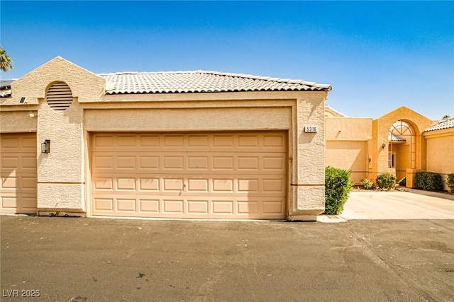 5316 Fieldstone Rd, Las Vegas, NV 89107 - view of front of house with a tile roof and stucco siding