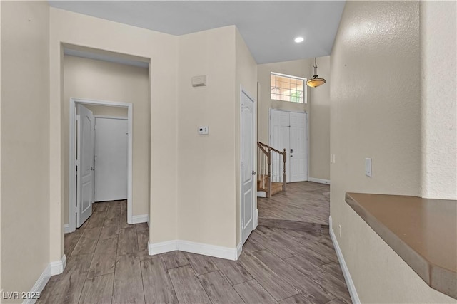 1717 Double Arch Ct, Las Vegas, NV 89128 - corridor featuring wood finished floors and baseboards