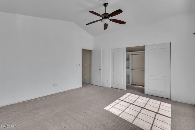 1717 Double Arch Ct, Las Vegas, NV 89128 - unfurnished bedroom featuring vaulted ceiling, carpet, a ceiling fan, and a closet