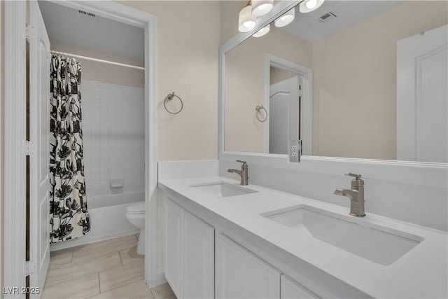 1717 Double Arch Ct, Las Vegas, NV 89128 - bathroom featuring double vanity, shower / bathtub combination with curtain, and tile patterned floors