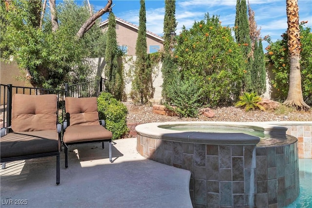 1717 Double Arch Ct, Las Vegas, NV 89128 - view of patio with an outdoor hot tub