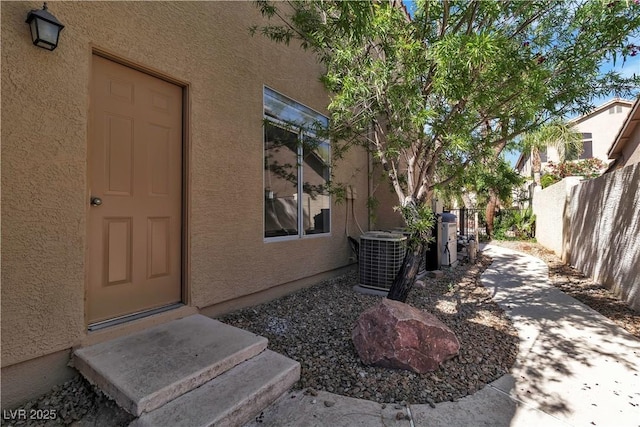 1717 Double Arch Ct, Las Vegas, NV 89128 - view of exterior entry featuring stucco siding and a patio area