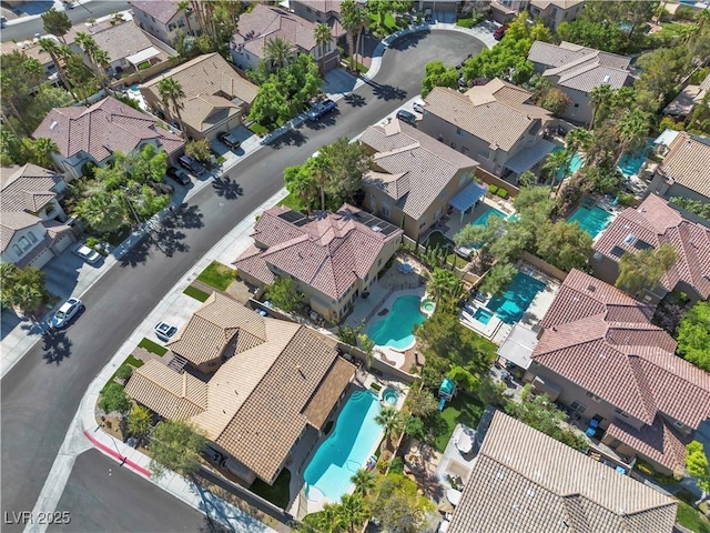 1717 Double Arch Ct, Las Vegas, NV 89128 - aerial view of residential area with a pool area