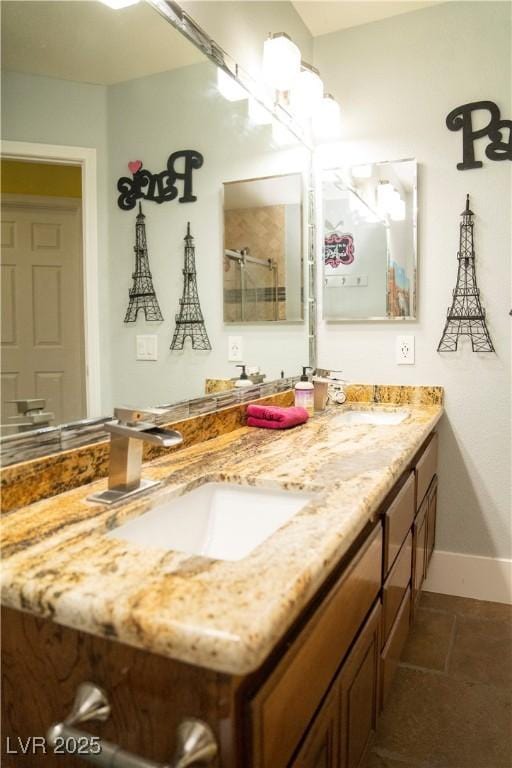 3436 N Tenaya Way, Las Vegas, NV 89129 - bathroom with double vanity, baseboards, a shower, and tile patterned flooring