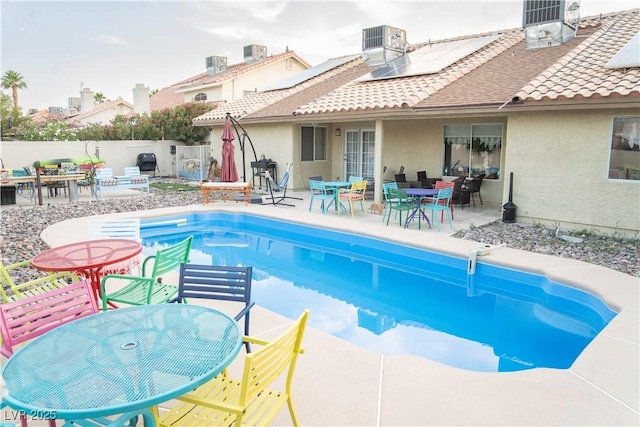 3436 N Tenaya Way, Las Vegas, NV 89129 - view of pool with outdoor dining space, a fenced backyard, a patio area, and central air condition unit