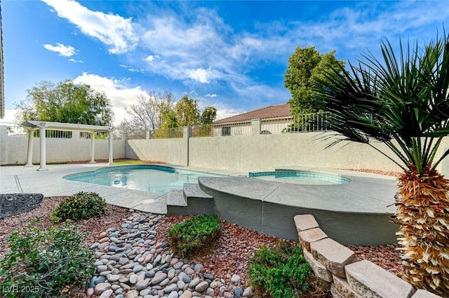 2714 Langlade Ave, Henderson, NV 89052 - view of swimming pool with an in-ground hot tub, a fenced backyard, and a patio