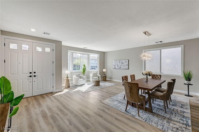 2714 Langlade Ave, Henderson, NV 89052 - dining area featuring wood finished floors, a chandelier, and recessed lighting